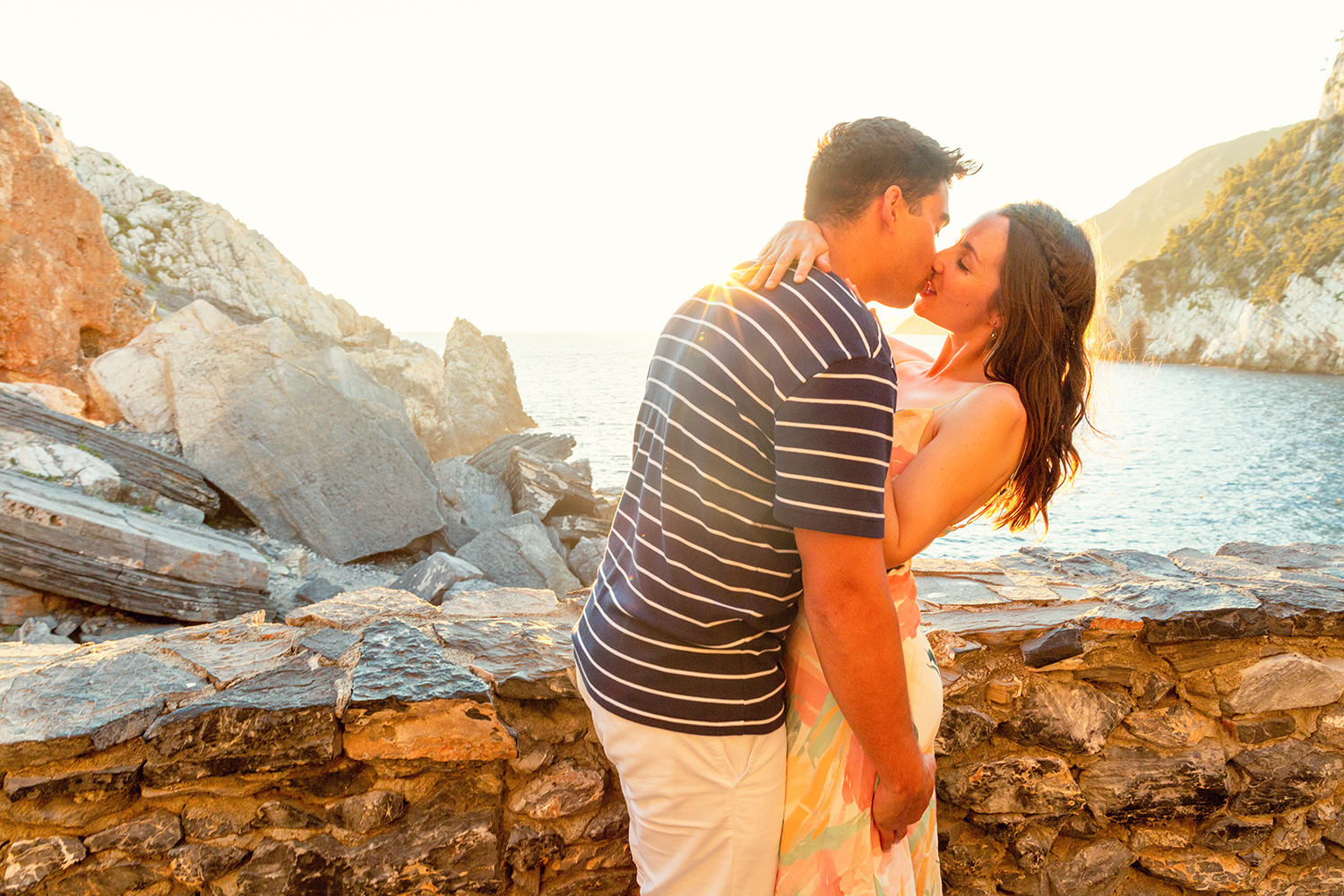 Couple engaged in Portovenere kissing