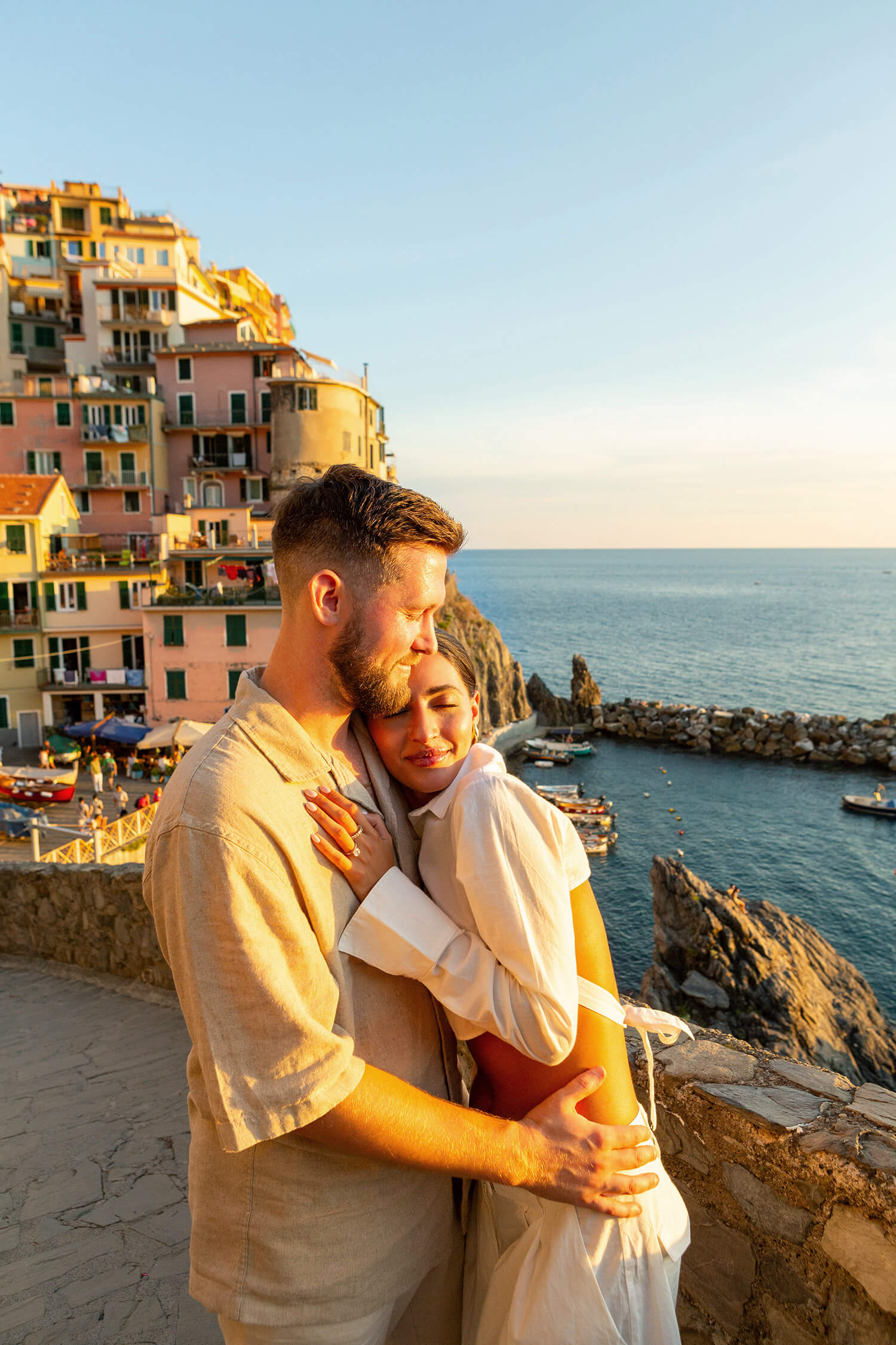 Couple in Manarola, Cinque Terre, during their engagement session