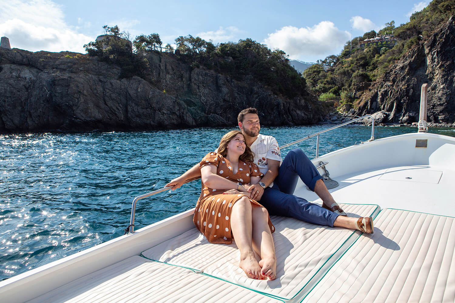 Couple on a boat in Monterosso, Cinque Terre, Italy