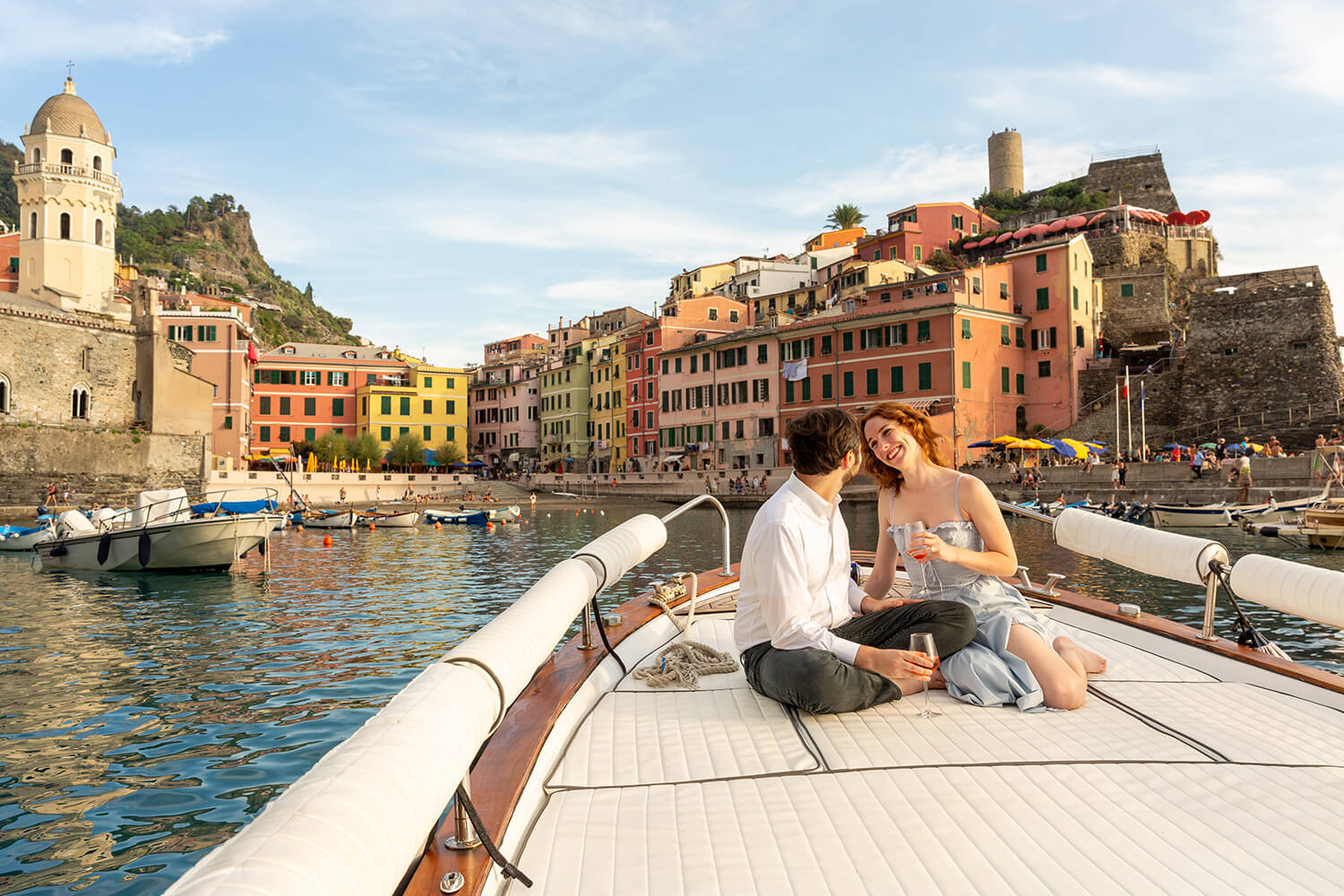 Couple on a boat in Vernazza, Cinque Terre, after a marriage proposal
